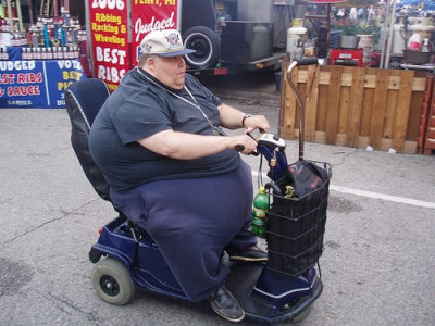 fat guy on scooter